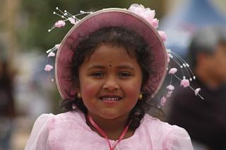  thought this little girl looked quite pretty with her pink hat on.